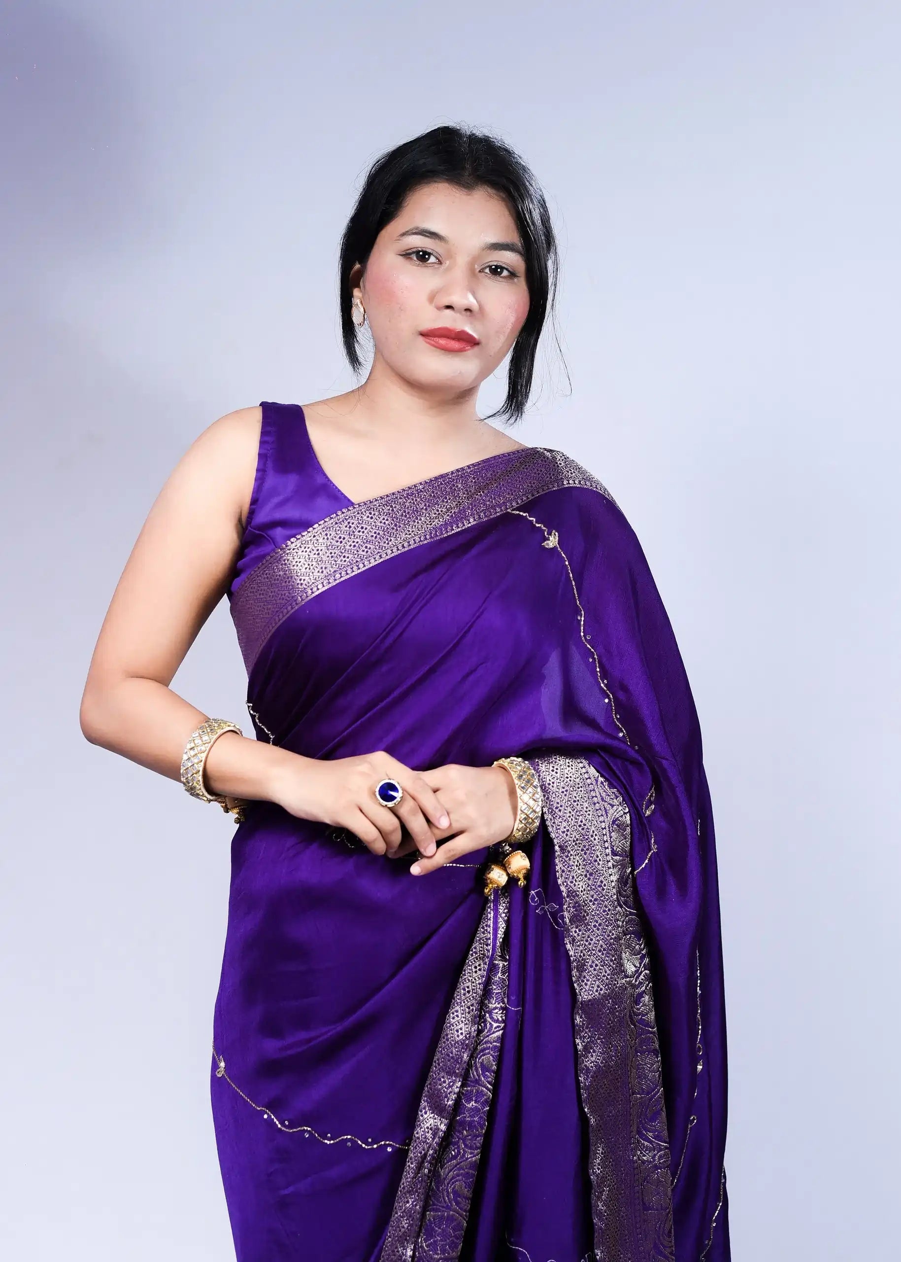 Royal Purple Dola Silk Saree with Intricate Zari Border and Designer Weave