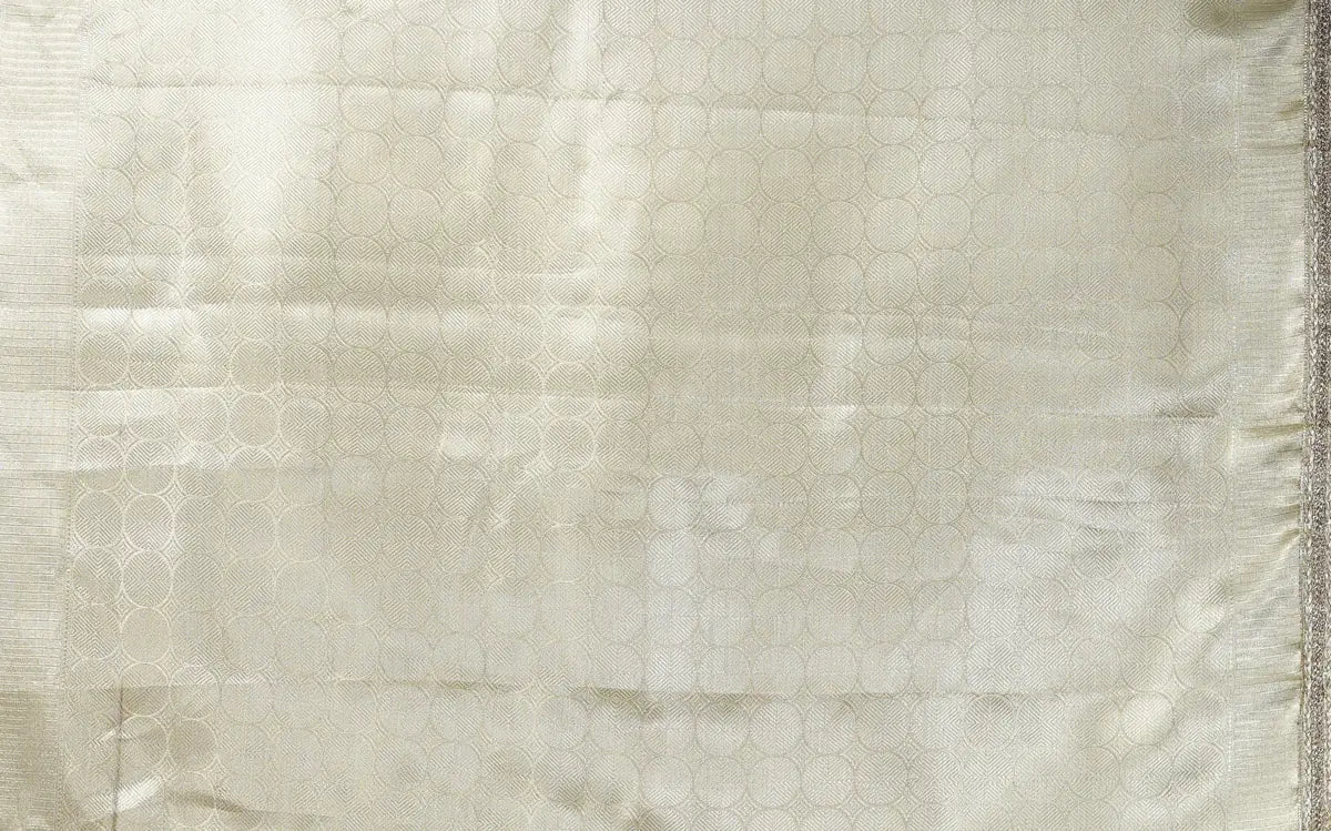 Banarasi Handwoven Gold Kanjivaram Tissue Saree with Zari Border & Subtle Lace